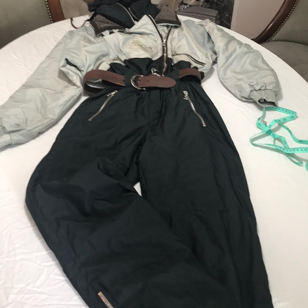 Sportalm fitted snowsuit with hood.